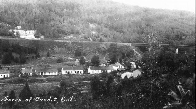 Forks_of_Credit_c.1928_-_Looking_south_across_Forks_of_Credit_Rd_toward_quarry_workers_cottages_west_of_Chisholm_St._-_Peel_Archives___Gallery
